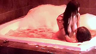 her tits bounce in the jacuzzi as she rides my cock moaning