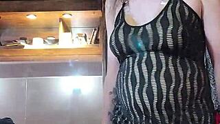 being naughty while modeling dresses, showing off big tits and sexy transsexual vibe