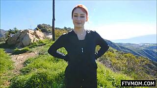 Look at this redhead milf flashing her sexy ass outdoors in public!