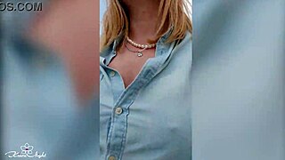 Blonde flaunts big tits in daring public nudity