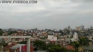 Feeling The Passion On The Balcony With Big Tits Exposed In Intense Moments.