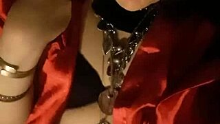 Teaser vid of shemale milf Regina Babylon in high boots, showcasing her ass and shoes.