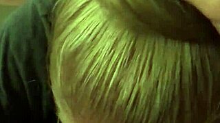 Is this milf wife sucking cock provocatively in the bedroom?