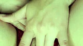 feeling hot, she touches her pussy and squirts in orgasm