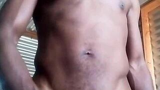 Kneeling and masturbating with big black cock and balls