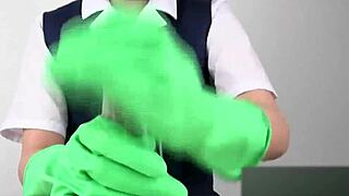 asian expert gives a slick handjob using latex gloves.