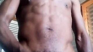 Kneeling and masturbating with big black cock and balls