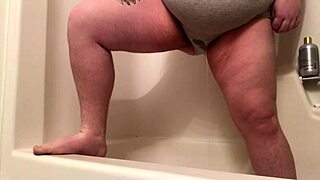 Katie, the blonde slut, pisses her panties then showers off in solo scene.