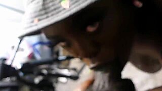 Amateur black whore gives sloppy blowjob to big cock