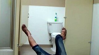 Staci performs on the bathroom floor in public