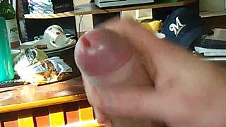 Solo transsexual performer jerks off while watching tranny porn, leading to intense cumshot