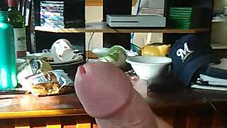 Solo transsexual performer jerks off while watching tranny porn, leading to intense cumshot