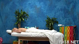 The masseuse dominates the babe on the desk, fucking her ass and squeezing her boobs in hardcore maledom action.