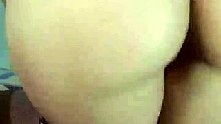 a teen dances reaggaeton mix on webcam, moving her body sensually