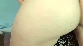 a teen dances reaggaeton mix on webcam, moving her body sensually