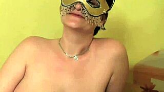 big tittied MILF in mask sucks and fucks
