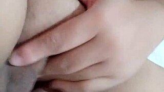 Beautiful Amateur Moans While Fingering Wet Pussy on Bed