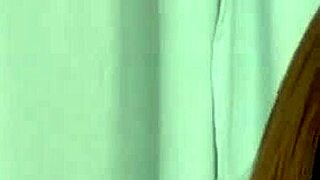 in this closeup, an ebony tgirl is being filmed neutrally