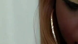 in this closeup, an ebony tgirl is being filmed neutrally