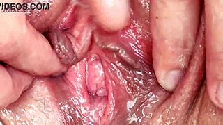 Extreme closeup of wet pussy fisting
