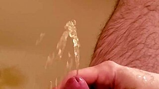 Old Man Gives Golden Shower To Small Cock