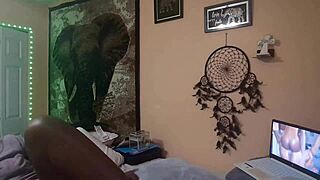 naejaye rubs her pussy watching lesbian porn