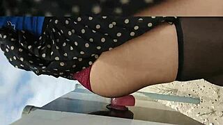 Fucking my dildo in the construction area with toys and skirt