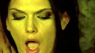 A skinny black-haired woman with small breasts engages in a threesome with two men