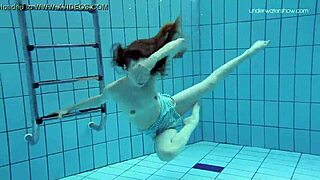 Skinny teen Anna Netrebko in bikini underwater.