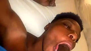 Ebony woman performs deepthroat blowjob on massive black cock