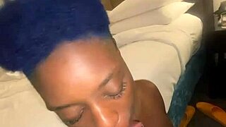 Ebony woman performs deepthroat blowjob on massive black cock