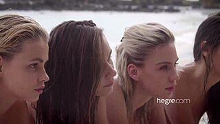 four beautiful girls nude on the beach