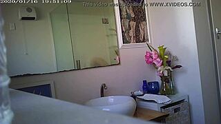 Granny showing off her massive boobs in a steamy close-up display.