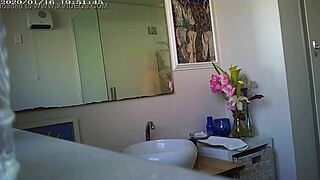 Granny showing off her massive boobs in a steamy close-up display.