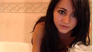 Teen participates in bucket challenge game on webcam