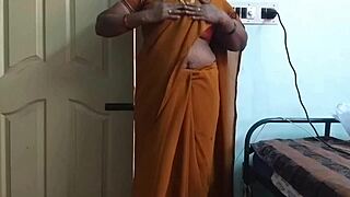 Vanitha rubs her shaved pussy hard