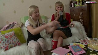 lesbian babe rides the strap-on dildo