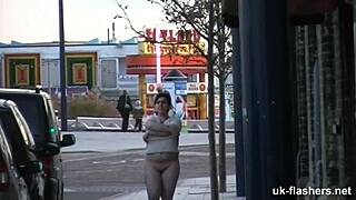 British milf shows big tits while masturbating in bar