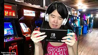 Chinese Gamer Girl Strips Topless in Public Scene