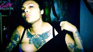 sexy latina in lingerie flashing boobs during striptease with ripped clothes and oiled skin to music