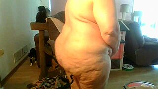 In this steamy scene, a woman gets her ass fucked anally while sucking cock in a piggy roast position