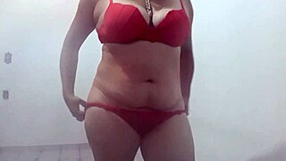 Hot latina dances seductively with lesbian partner