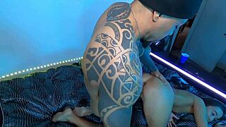 Suggestive Asian sex under blue light