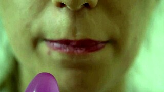 Watch This Teen Sucking Dildo!