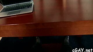 A sophisticated gay hunk gets a blowjob from another guy