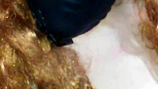 Bound Woman Masturbates With Black Dildo Under Face Mask.