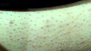 Bound Woman Masturbates With Black Dildo Under Face Mask.