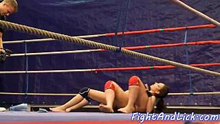 European babes with implants engage in intense lesbian wrestling