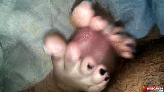 Couple Performs Footjob Leading to Cum on Webcam