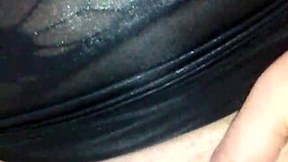 Bound Woman Masturbates With Black Dildo Under Face Mask.